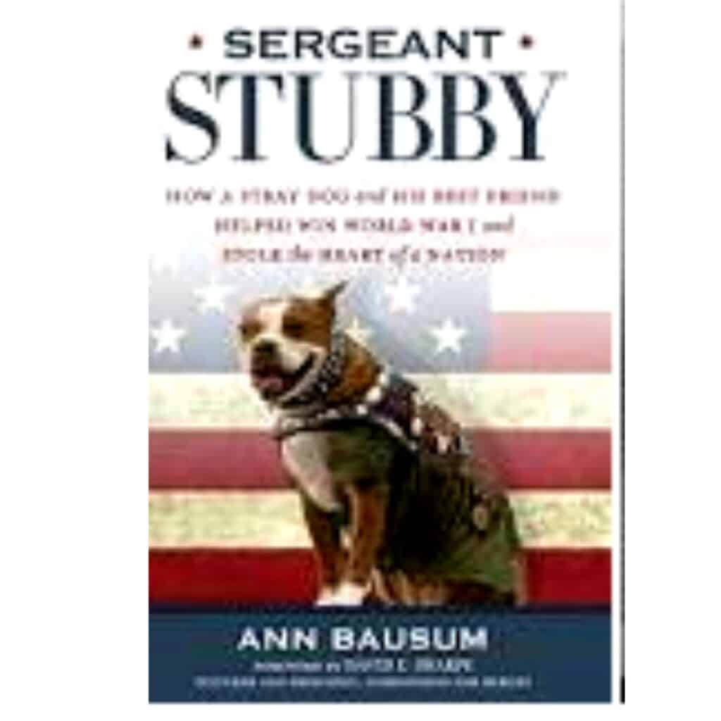 A book cover of a book all about Sergeant Stubby a Pitbull cross that served in WWI that is brown with white feet and toes.