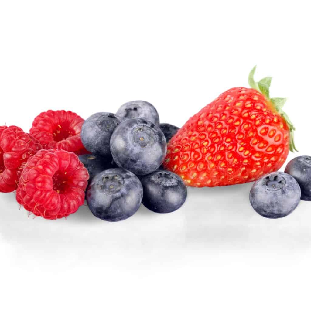 Blueberries, strawberries and raspberries showing fruits that dogs can enjoy.